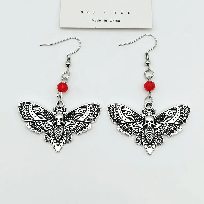Brinco gótico mariposa de caveira