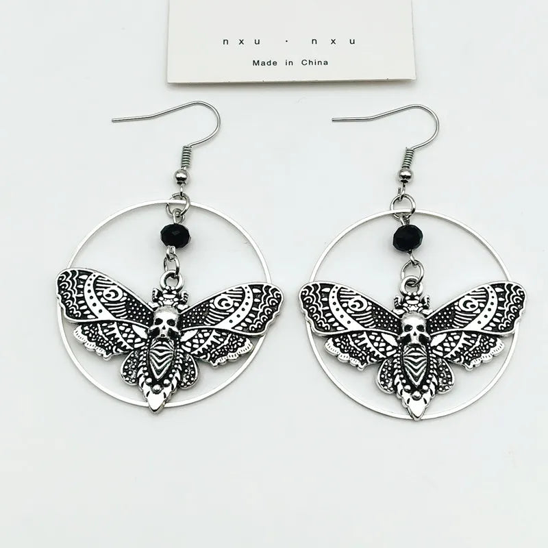 Brinco gótico mariposa de caveira